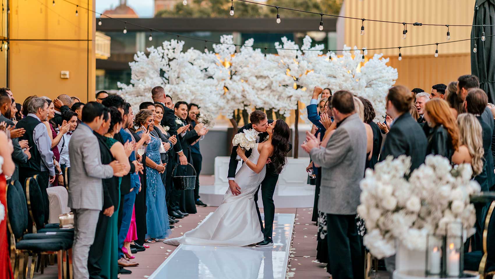 Post-Nuptials Aisle Kiss on Magnolia Terrace