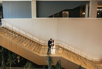 couple standing on the stairs